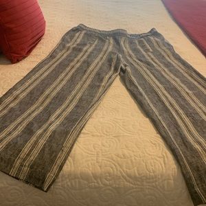 Wide leg (12”) all the way down. Inseam 31”. Light weight material